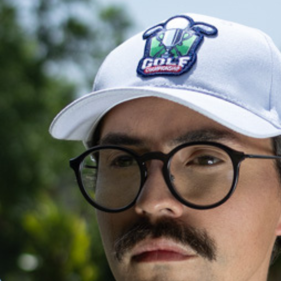 man wearing a hat with a FlexStyle PVC patch