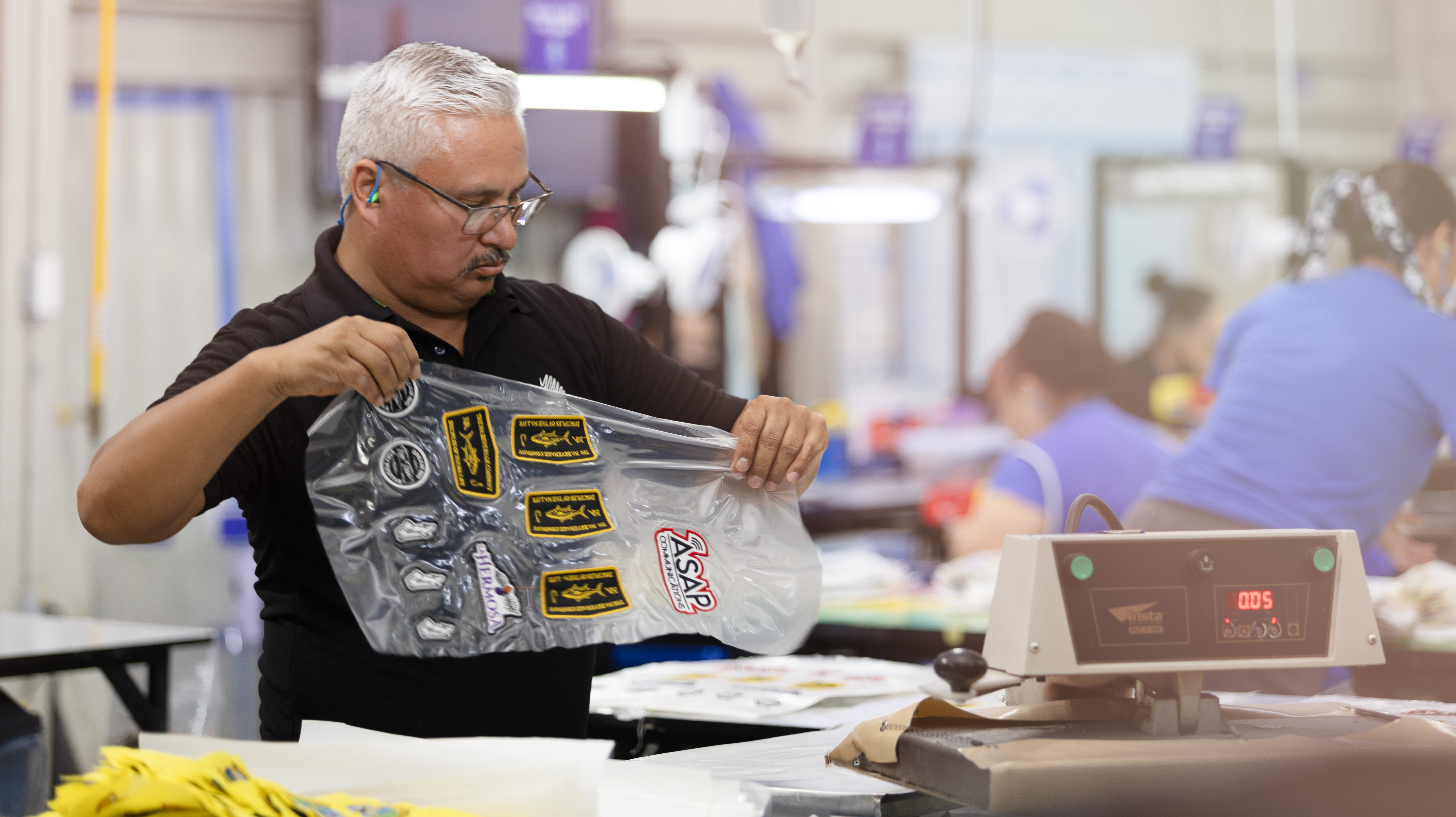 Operator in Finishing Area at World Emblem Mexico