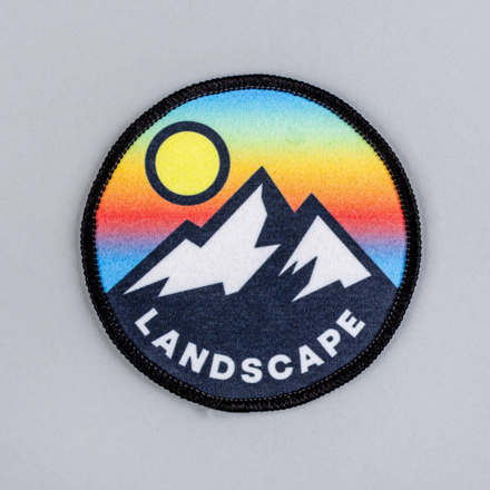 Sublimated mountain landscape patch laid flat